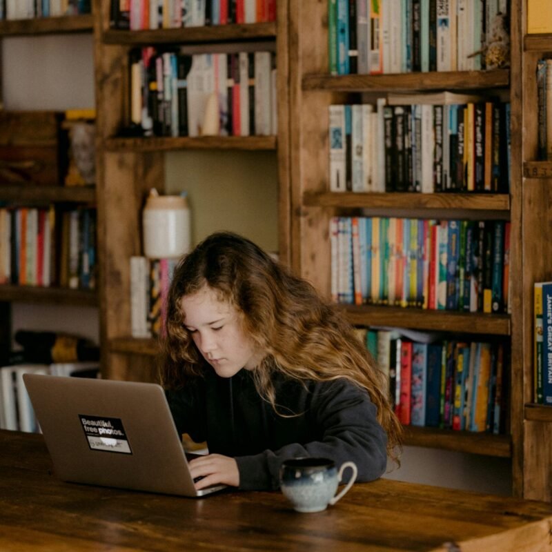 An older student studying at home during an online lesson.